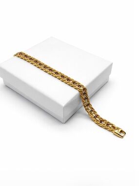 Triple Strand Gold Tone Bracelet Enhanced with Purple & Clear Rhinestone Accents